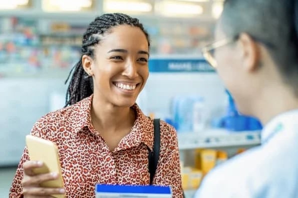 smiling woman with phone