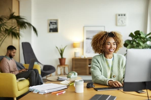 CSS transform property being used by a woman on a computer