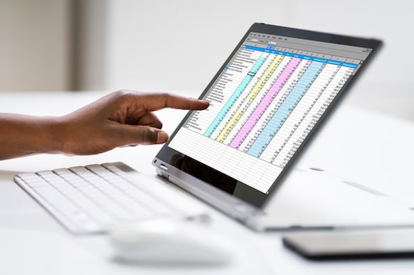 salesperson using a CSV import for contact management