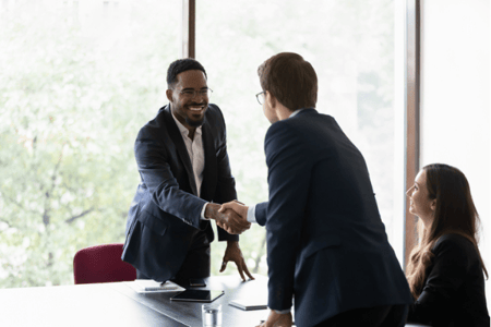 Sales person using the best closing techniques to close a sale