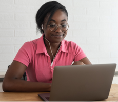 person using a laptop at a table