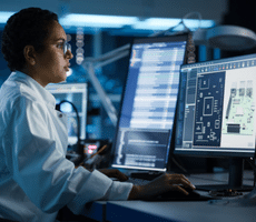 person using a computer in a data center