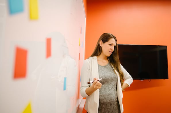 person teaching lean UX in a conference room