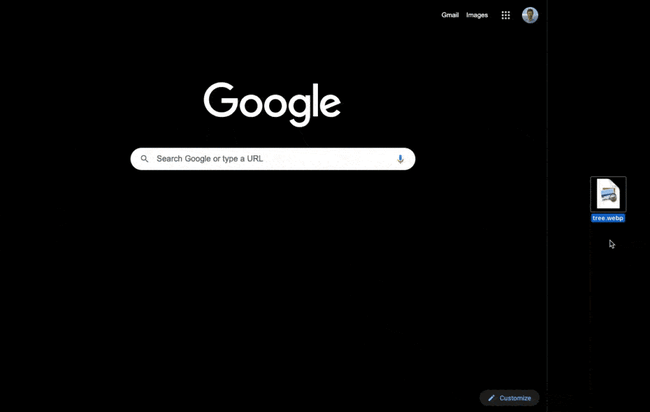 clicking and dragging a webp file icon into the chrome browser to open the file 