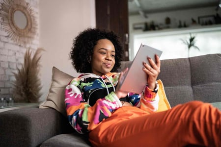 person reading a wordpress book on a tablet