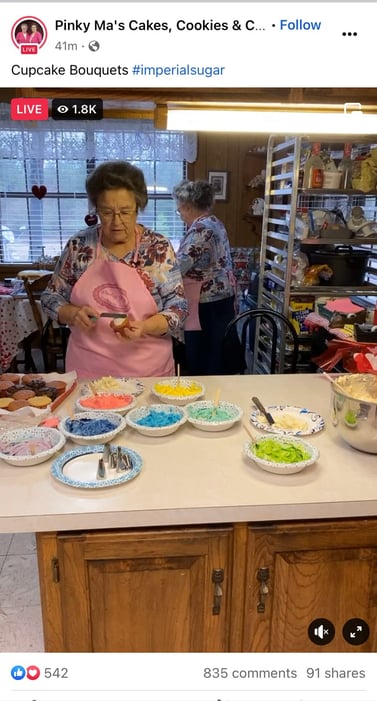 Two business owners show their followers how to make a cupcake bouquet via Facebook Live. 