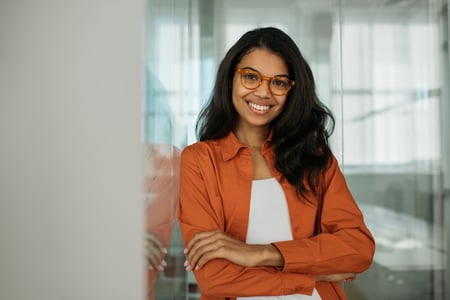 Woman smiling while presenting swagger api example 