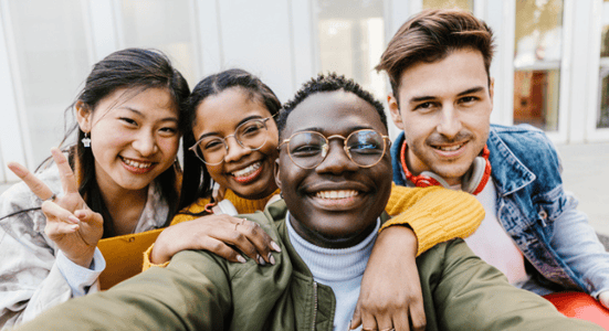 likable group of people taking a charismatic selfie