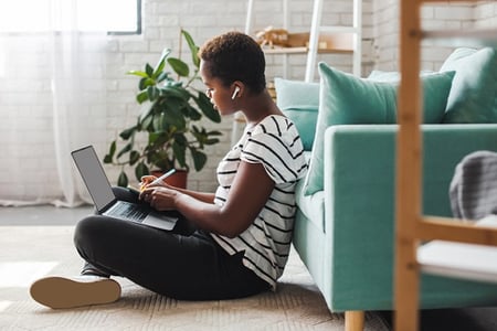 Woman working hard on learning about DevOps.