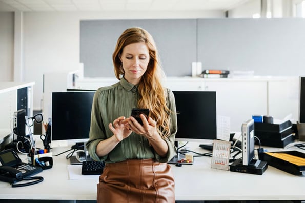 A marketer swipes through a For You page feed of TikTok Stories and long videos.