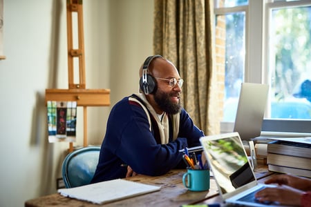 person using accessibility icons on a computer