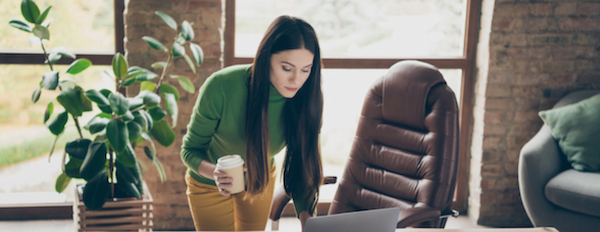 person using a laptop in an office