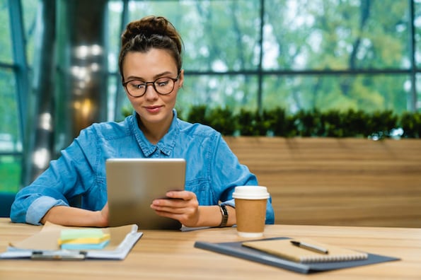 Marketer reading one of the best marketing articles of all time