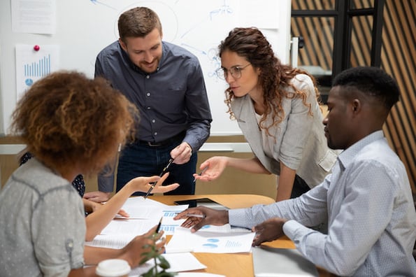 businesspeople discussing big data challenges 