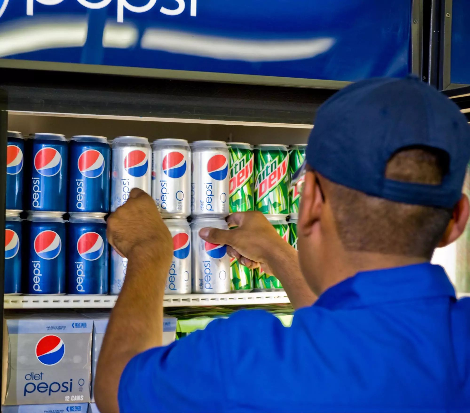 Pepsi logo featuring a circular red, white, and blue design with a wavy white line in the center