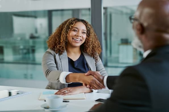 event marketer meets with potential sponsor for upcoming event