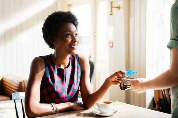 a small business using a credit card processor to accept customer payment 