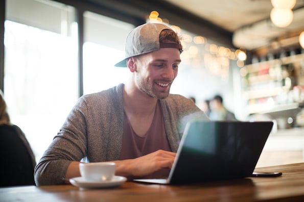 Person on computer searching for free alternatives to google maps