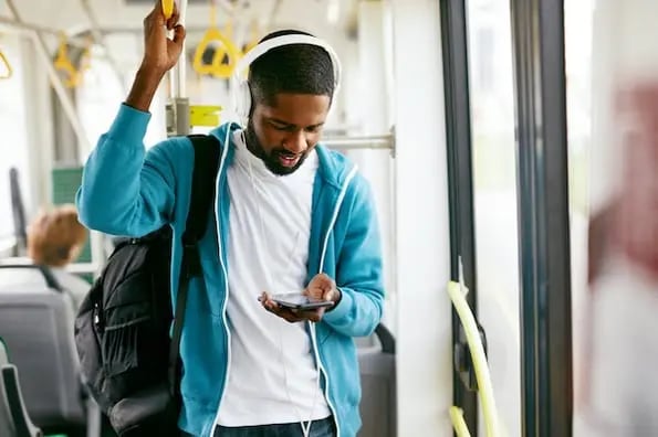 man using google maps API on his mobile phone