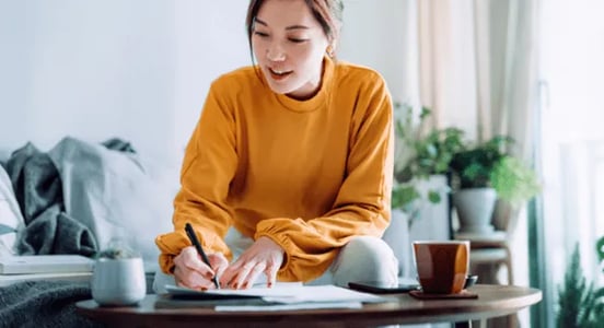 woman writing grammar jokes