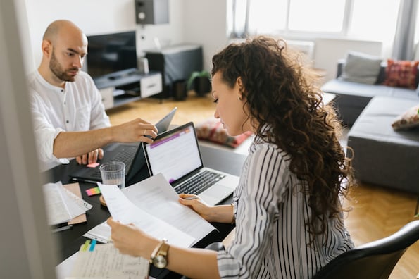 two team members tracking changes in google docs