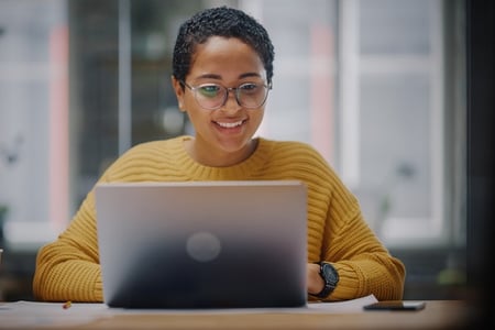 A young woman studying how closures work and ways she can use them to enhance the code she creates for her software.