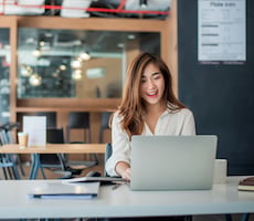 person using a computer in an office