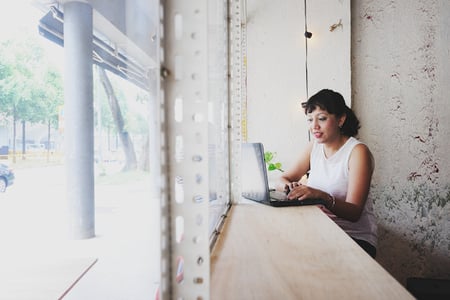 person viewing order form examples on a laptop