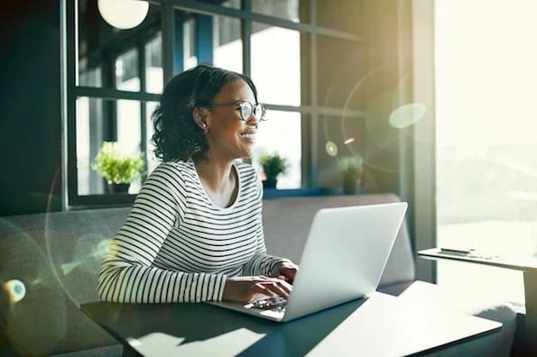 Smiling person with a positive attitude at work