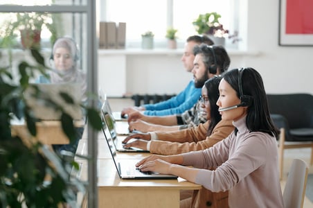 call center agents answering customer questions during a crisis