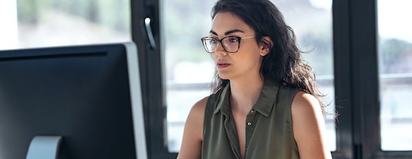 person using a desktop computer