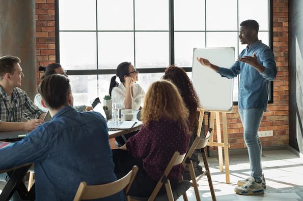 person giving a presentation in a meeting