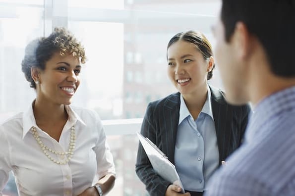 salespeople reviewing 2022 sales benchmark data and applying that insight to improve their efforts