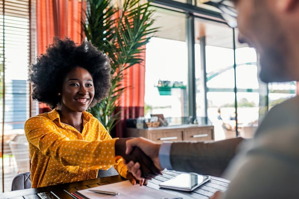 Sales director interviewing a candidate for the sales manager position