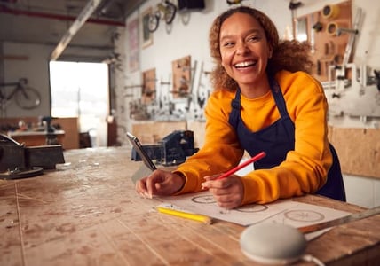 Craftswoman uses smart speaker to ask customer service questions