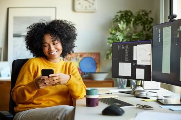 woman answering an online survey on phone