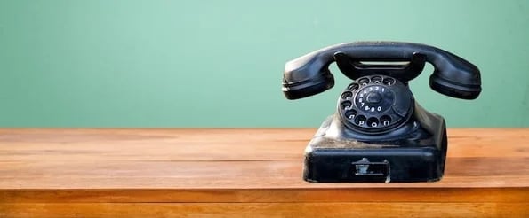 phone-selling strategies top salespeople use: photo shows retro phone on desk