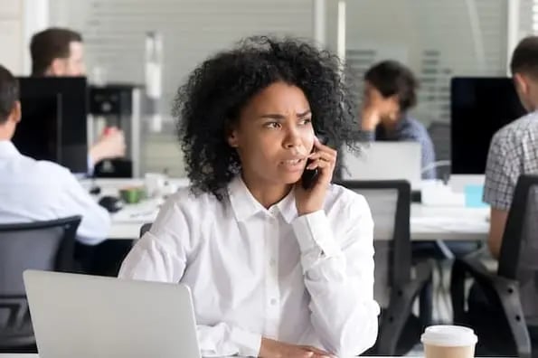 sales professional on phone handling an unusual sales objection