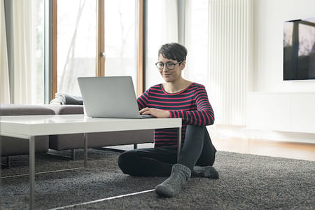 person using custom wordpress blocks on a laptop