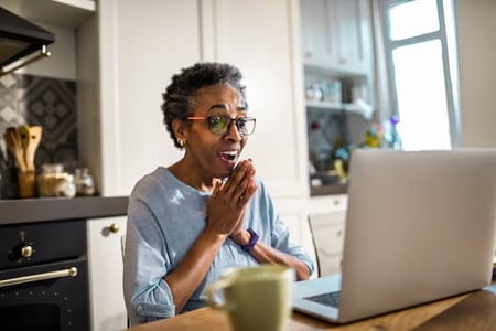 Woman excited about finding the perfect WordPress Glossary Plugin to buy for her developer grandson