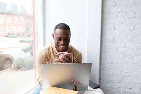 man using the wp optimize plugin in the office